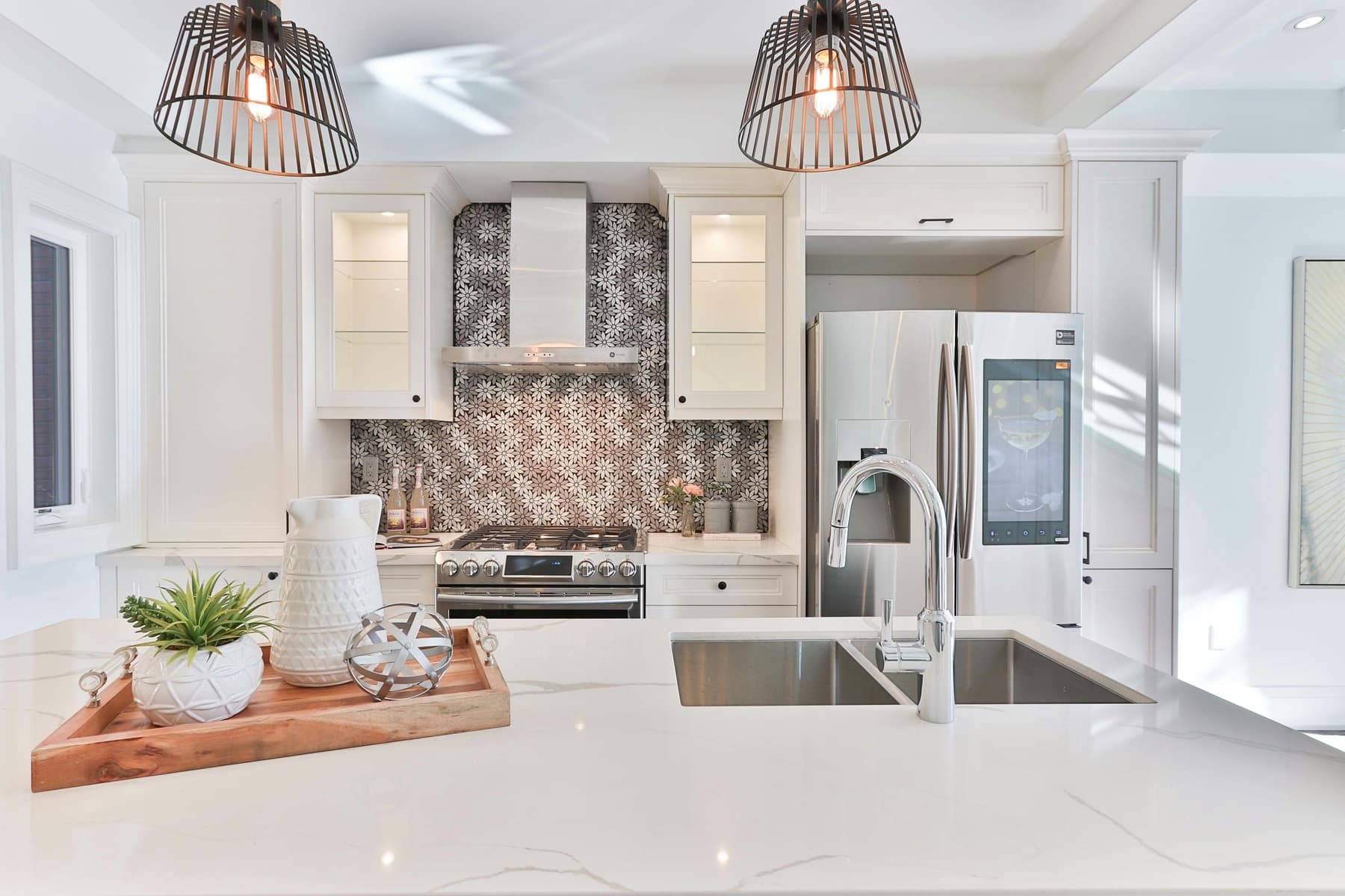 Modern kitchen with custom white quartz countertops in New Berlin